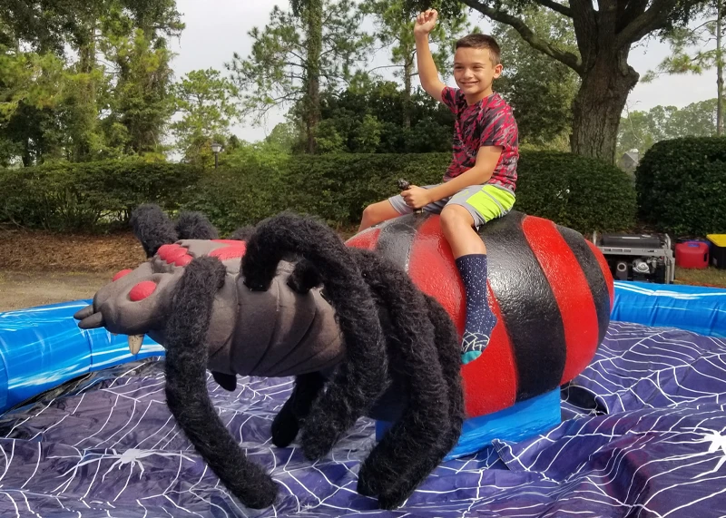 The Web Master mechanical spider ride rental set up for a Halloween event